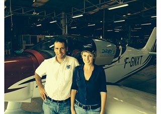 Fernando Figueirédo (instructor) and Kayla Graham at the Robin Aircraft manufacturing plant in Dijon, France. Photo courtesy Kayla Graham.