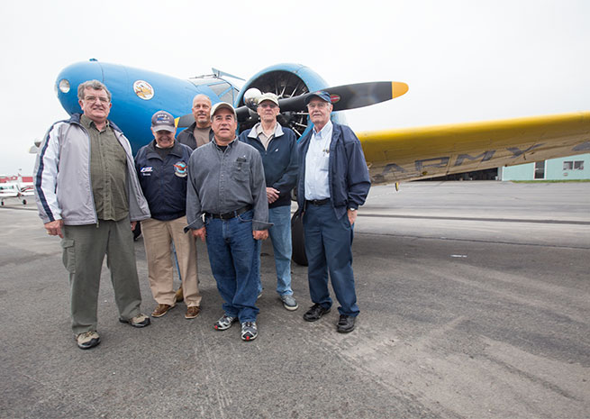 The Friday Chow Hounds, from left: Bill Stoddard (standby passenger), Warren Ecklund, Steve Reichert (filling in for a regular), Steve Medeiros, Ken Hadley, Bob Trinque (pilot).