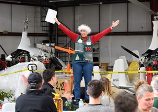 Chesapeake Sport Pilot's chief flight instructor Helen Woods welcomes pilots to the annual Tangier Island Holly Run.