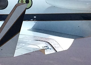 Detail copied from the NASA photo above shows the Adaptive Compliant Trailing Edge in action. 