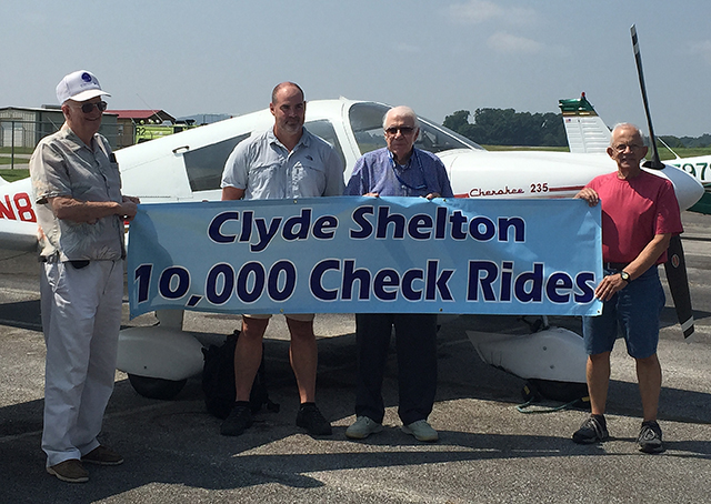 Tennessee Aviation Hall of Famer, retired NASA employee, and designated pilot examiner Clyde Shelton is recognized for awarding his ten thousandth certificate on Sept. 5, 2015, in Huntsville, Alabama. Photo courtesy of Donna Meyer.