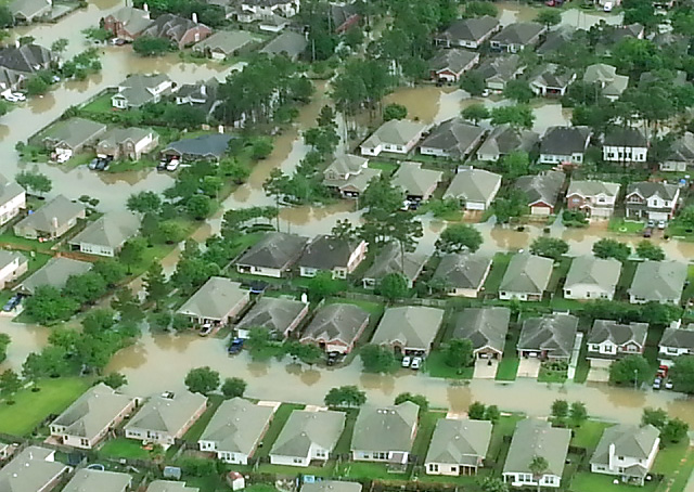Houses are under water in vicinity of Weiser Airport near Cypress Creek and northwest of Houston. Photo by Pat Brown.