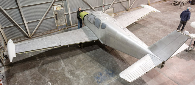 The 1963 Debonair has been stripped of its old paint and it's having a new cowl door refitted thanks to Beechcraft.