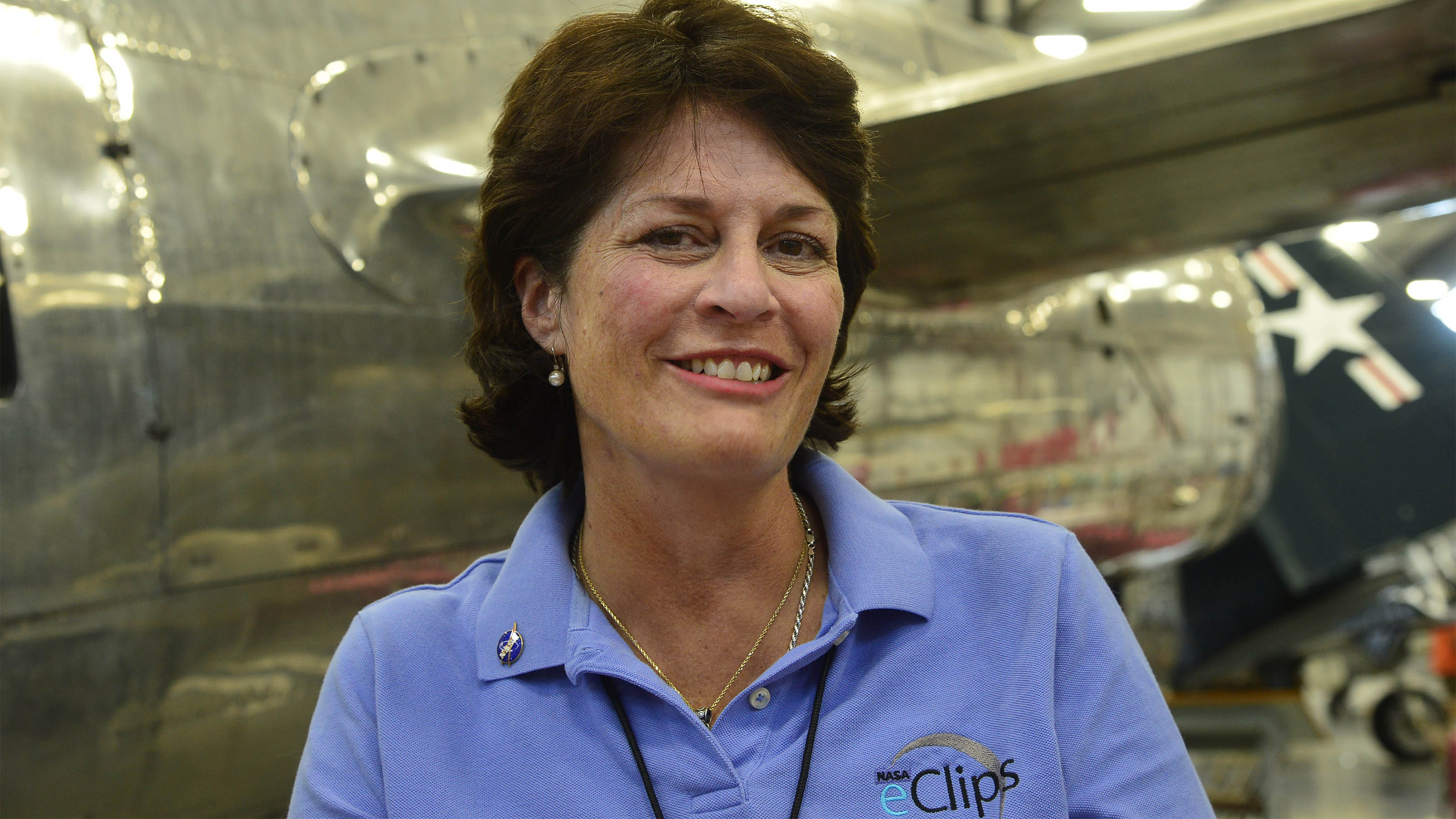 NASA's eclipse citizen science outreach director Kristen Erickson, shown in a portrait at Madras Municipal Airport in Madras, Oregon, helped organize the community-based science, technology engineering, and math projects for the total solar eclipse. Photo by David Tulis.
