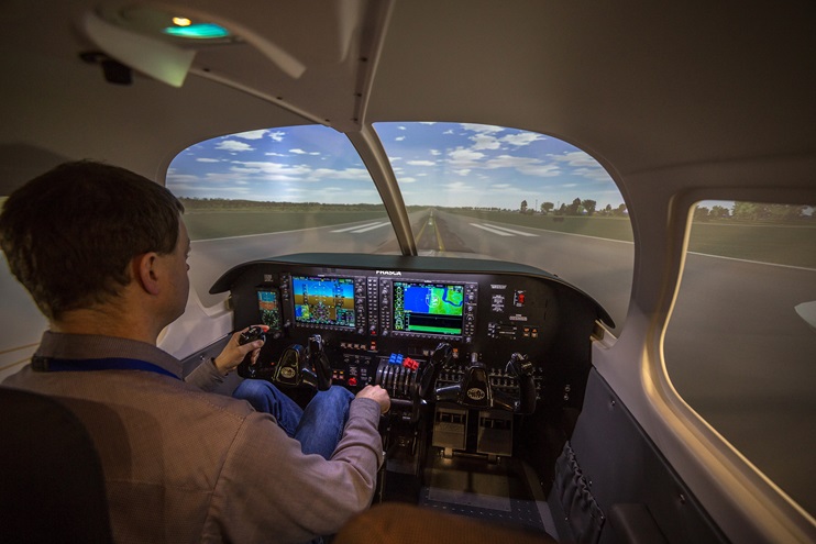 Frasca International Inc. is updating the University of North Dakota's simulator training fleet with Garmin's G1000 NXi avionics suite, as pictured in a Piper Seminole flight training device. Photo courtesy of Frasca.