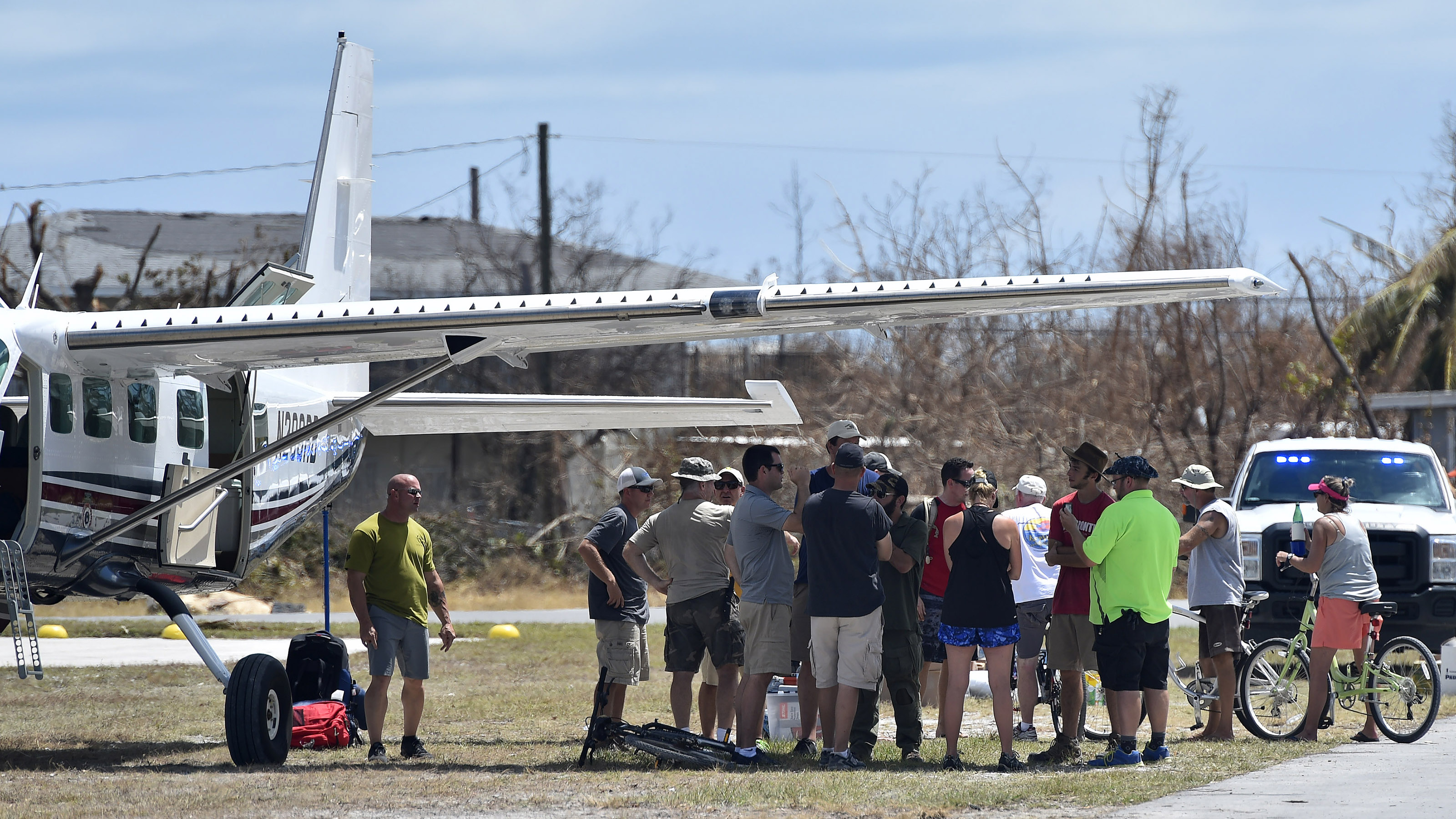 A Cessna Caravan piloted by AERObridge's Peter Burwell drops off supplies and picks up evacuees Sept. 15 at Florida's Summerland Key Cove Airport after Hurricane Irma swept over the tiny island airfield. Photo by David Tulis.