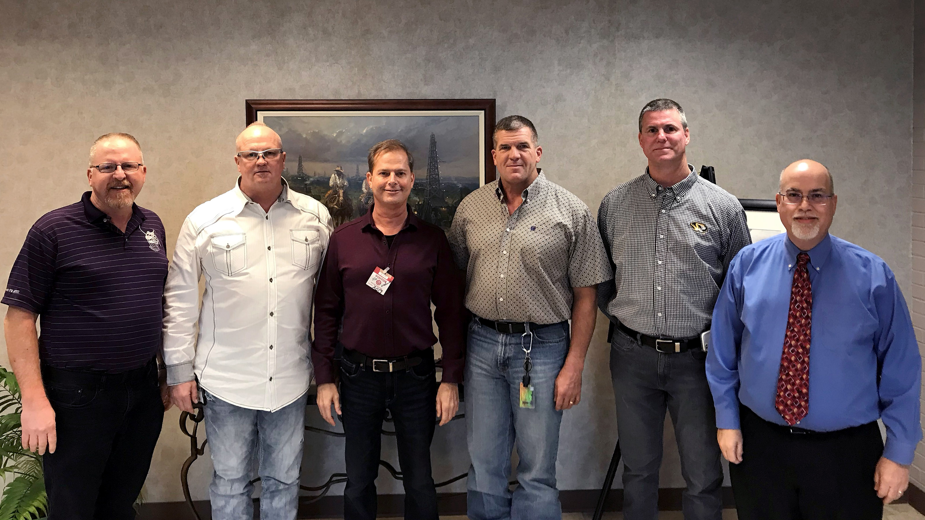 Hugh Hunton, Thomas Herd, pilot Peter Edenhoffer, Phil Enis, Charlie Porter, and Bryan Beck at Fort Worth Center. Photo courtesy of Doug Church.