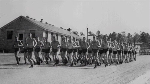 Paratroopers participate in physical training exercises at Camp Toccoa. Photos courtesy of Stephens County Historical Society, Inc. 