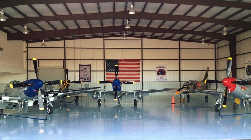 The Stallion 51 hangar full of North American P-51 Mustangs (and an L-39) will become an AOPA Rusty Pilots Seminar classroom on March 3. Photo courtesy of KT Budde-Jones. 