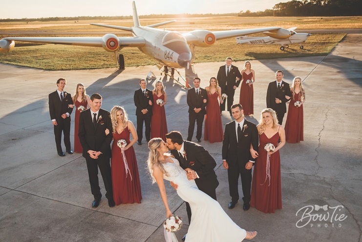 Aviators and Embry-Riddle Aeronautical University graduates Mindy and Kevin Lindheim chose the Valiant Air Command Warbird Museum in Titusville, Florida, as a spectacular backdrop for their wedding. Photo courtesy of Mindy Lindheim and BowTie Photo. 