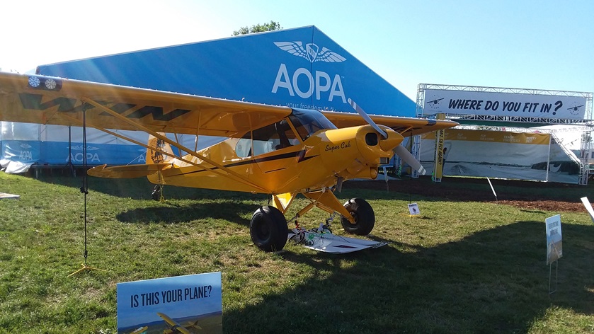 The AOPA Sweepstakes Super Cub is open for inspection at EAA AirVenture in Oshkosh, Wisconsin, and members love every inch of it. Photo by Alyssa Cobb.