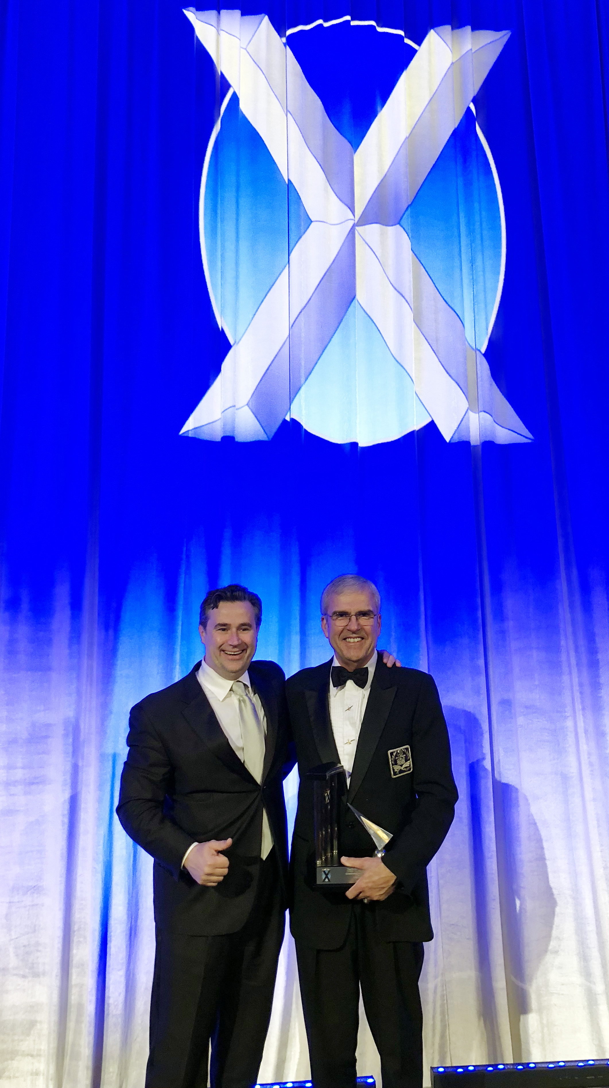 Perlan Project pilot Jim Payne, right, accepts the Iven C. Kincheloe Award from the Society of Experimental Test Pilots Sept. 29. Miguel Iturmendi, also a member of the society, is pictured with Payne. Iturmendi flew one of the record-breaking flights this season with Payne, to over 65,000 feet on Aug. 28. Photo courtesy of the Perlan Project/Airbus.