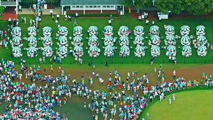 2019 Masters Tournament patrons stream through the public areas behind the Clubhouse on April 13. Photo courtesy of Eureka Earth by Civicus Media LLC.