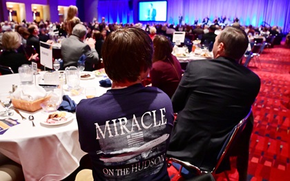 Passengers and family members participate in a 10-year anniversary celebration of the US Airways Flight 1549 event that became known as the Miracle on the Hudson, during a luncheon in Charlotte. Photo by David Tulis.