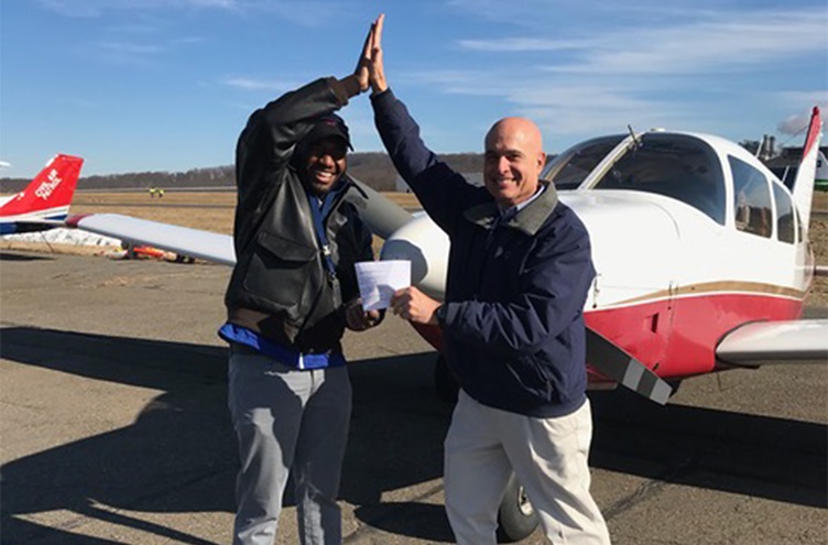 An AOPA flight training scholarship in 2018 allowed Tony Adams, left, shown with his mentor and instructor Alan Amato, the financial resources to earn his private pilot certificate. Photo courtesy of Tony Adams.