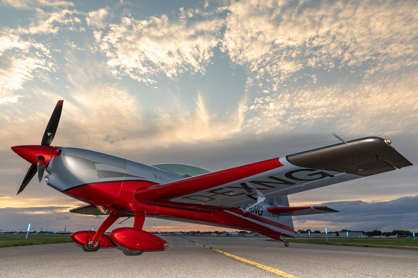 The new all-composite Extra Aircraft NG is unveiled at EAA AirVenture July 22. Photo by Evan Peers, Airspace Media.