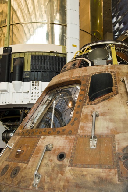 The Apollo 11 command module, used on the first space flight to land on the moon, being cleaned and maintained at the National Air and Space Museum in Washington, D.C.