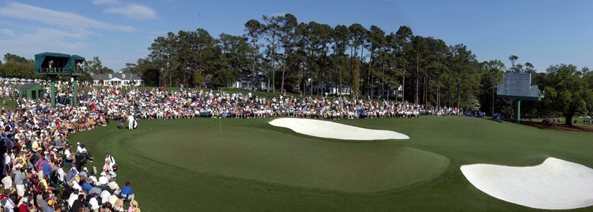 In this file photo, the 18th green at Augusta National Golf Club spreads out in a panorama of green and blue during the Masters Tournament. Photo by David Tulis.