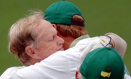 Masters champion Jack Nicklaus hugs his son Jack II during the 2005 Masters Tournament. Nicklaus, with six Masters wins, and golfing great Gary Player, with three green jacket wins, currently serve as honorary starters. Photo by David Tulis.