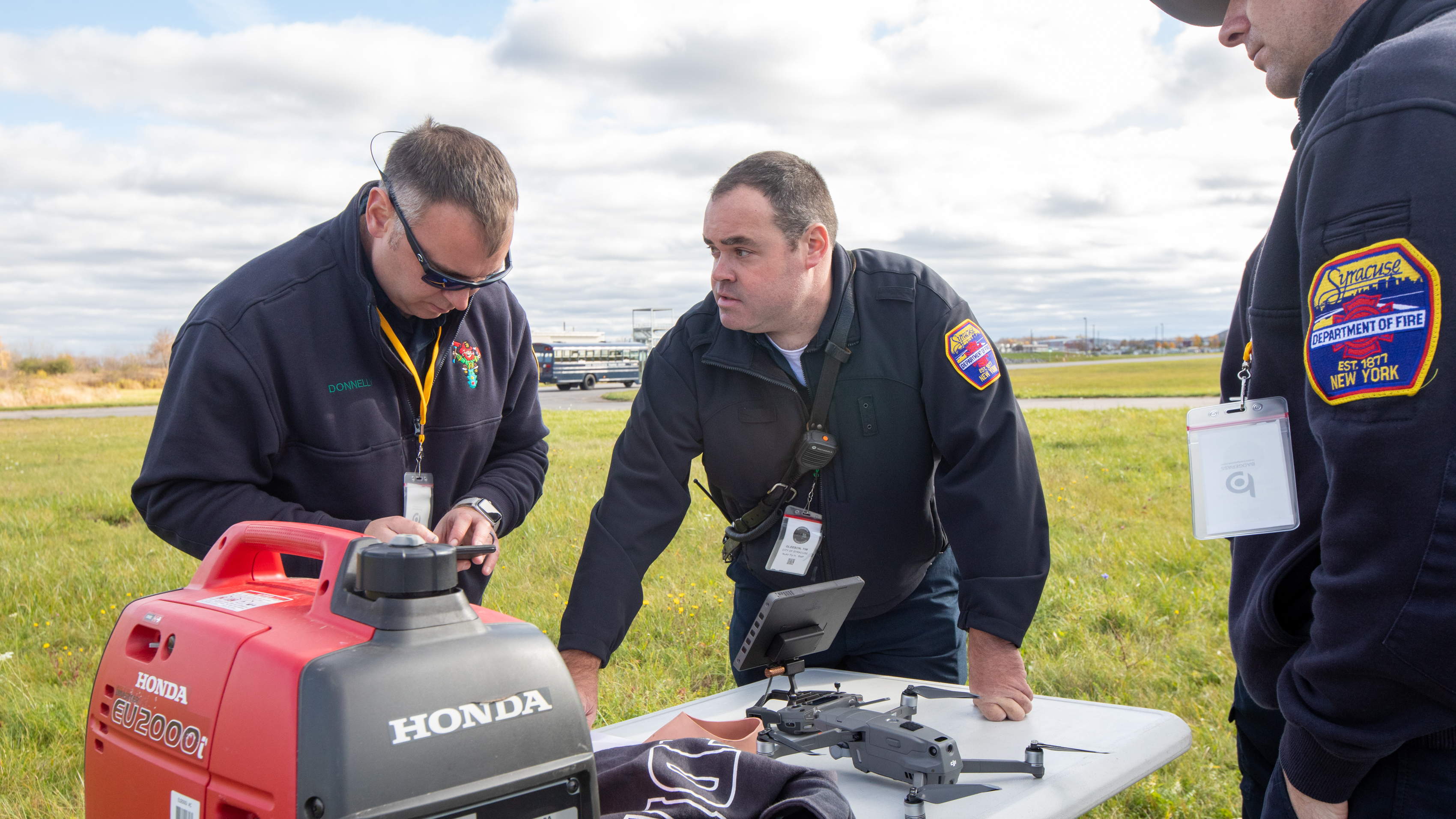 Tim Gleeson, center, who works for the fire department in Syracuse, New York, helped organize the NUAIR public safety unmanned aircraft fly-in. Jim Moore photo.