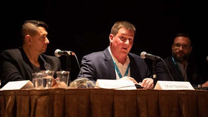 Matt Dunlevy, CEO of North Dakota-based drone services provider SkySkopes, talks about his firm's participation in breaking new ground on flights beyond visual line of sight during a panel discussion at the InterDrone conference in Las Vegas Sept. 3. Photo by Jim Moore.