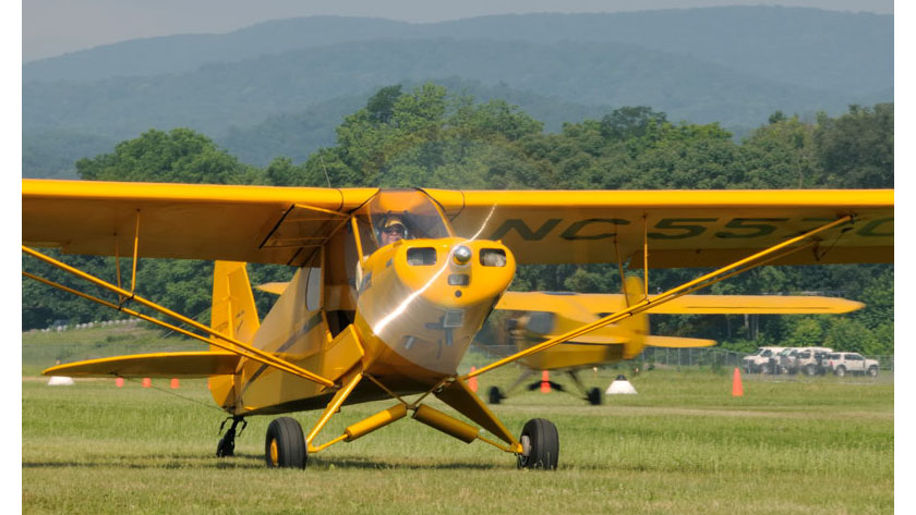 A Cub taxis for takeoff at the 2012 Sentimental Journey fly-in. Photo by Mike Collins.