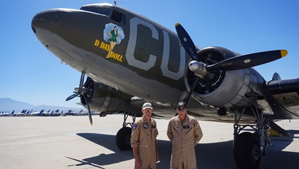 Crewmembers Andy Conley and Mike Lindgren in front of lead ship, C–53 “D-Day Doll.” Photo by Alicia Herron.