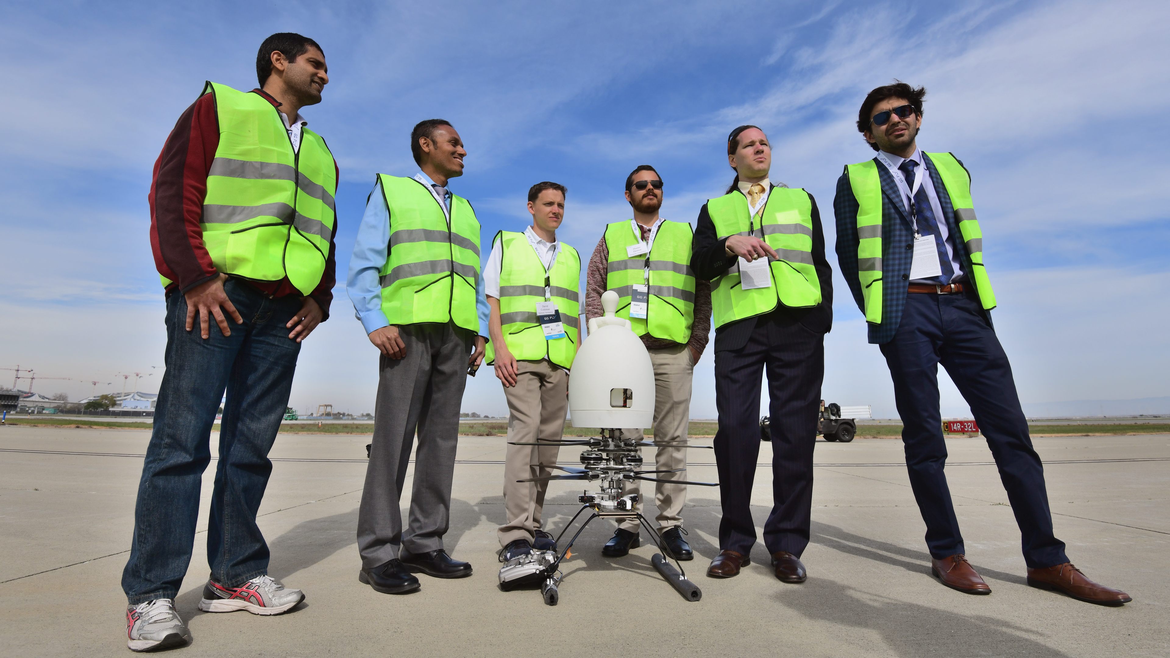 Members of the Texas A&M Harmony team pose after demonstrating a scale model of their Aria personal helicopter at the GoFly Prize Final Fly Off. Photo by Mike Collins.