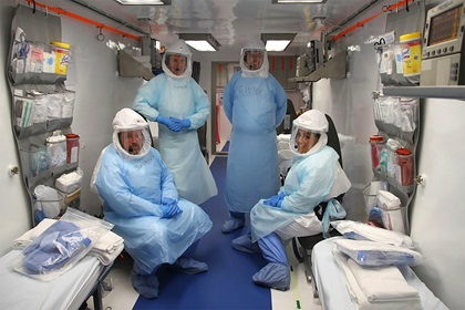 Phoenix Air medical employees are inside a containerized biocontainment system designed to contain viruses that is temporarily installed inside a Kalitta Air Boeing 747-400 cargo aircraft during a drill at Hartsfield-Jackson International Airport in Atlanta. Photo courtesy of Phoenix Air.           