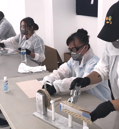 Piper employees make clear face shields to assist medical personnel on the front lines of the coronavirus pandemic. Photo courtesy of Piper Aircraft.
