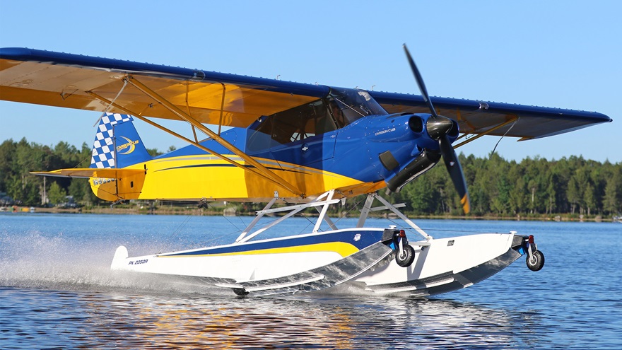 Jim Crane departs Caribou Pond in Lincoln, Maine, in his Carbon Cub on PK 2050A floats. Photo courtesy of Kerwin Whitney.