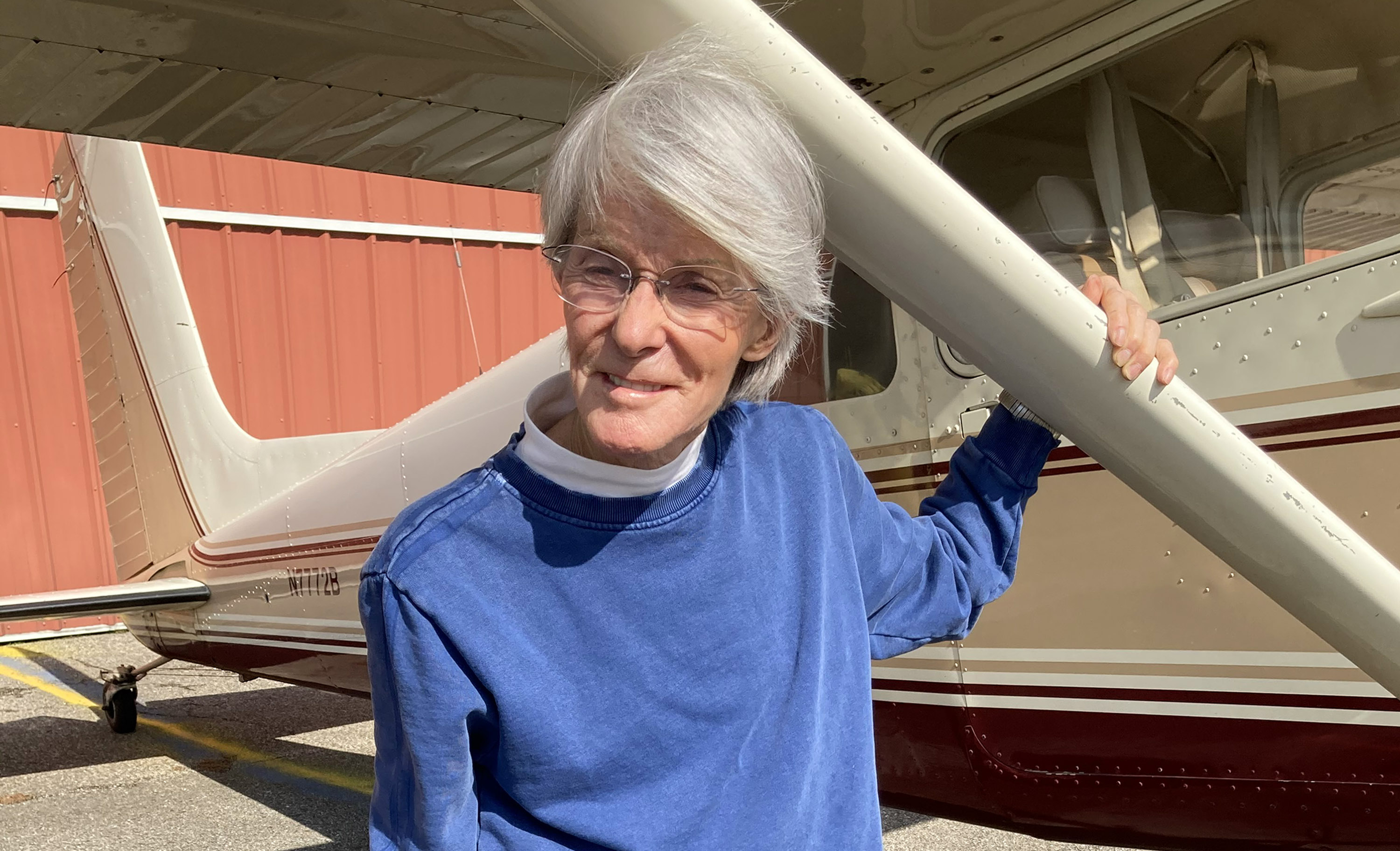Martha Lunken and her 1956 Cessna 180. Photo courtesy of Martha Lunken.