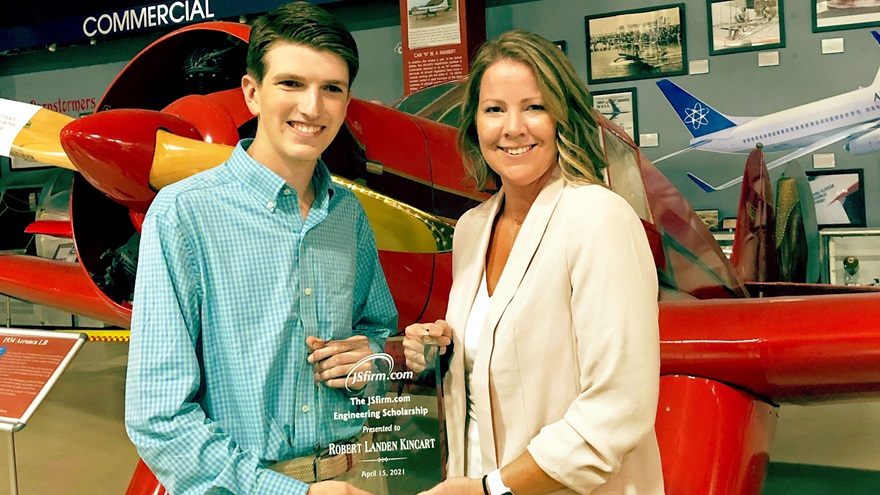 JSfirm.com Executive Director Abbey Hutter awarded a $1,500 aerospace engineering scholarship to Central Florida Aerospace Academy student Robert Landen Kincart. Photo courtesy of JSfirm.com.
