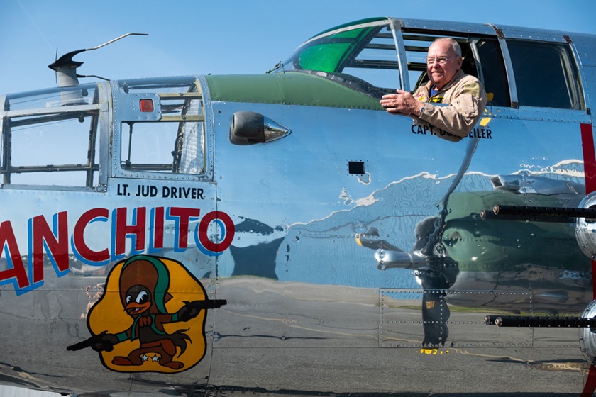 Tom Womack does the B-25 hero pose while prepping for a flight in "Panchito." The second-in-command type rating course he won was in remembrance of his father, a bombardier/navigator in Mitchells during World War II. Photo by Sabrina Kipp, courtesy of the Delaware Aviation Museum Foundation.