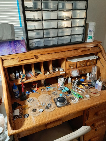 Ralph Freshour assembles the watches he sells on this rolltop desk, which can be closed to separate work from the rest of his day, and his cats from the small parts and pieces. Photo courtesy of Ralph Freshour.