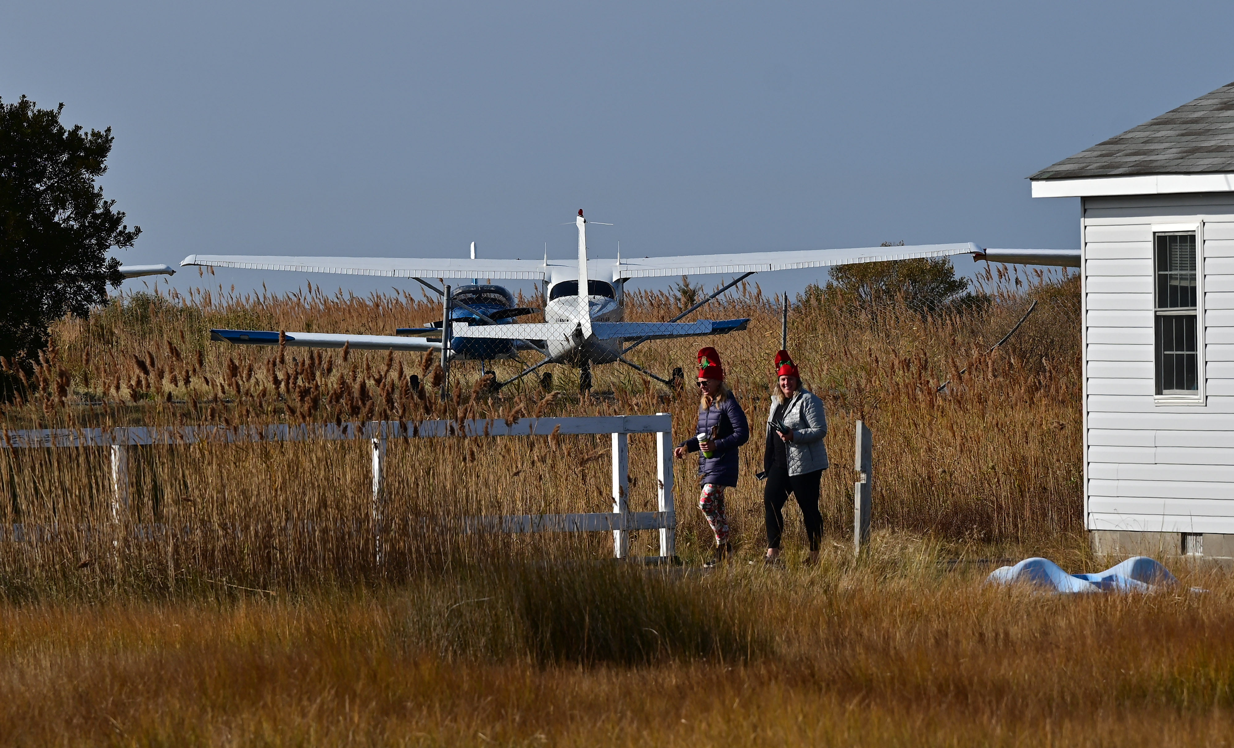 Student pilots Michelle Held and Tina Richardson accompanied their instructor during a charity fly-out to Tangier Island, Virginia. Photo by David Tulis.                                                                                                                                      