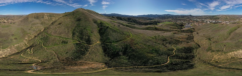 This panoramic image created by NTSB investigators from multiple photographs shows the crash site (bottom left), with U.S. Route 101 visible in the upper right. Image courtesy of the NTSB.