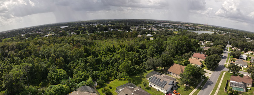 This composite image made from multiple frames should give you an idea of what you can reveal with a nice smooth pan, starting from the left and panning right to reveal the distant storm clouds, then shift the viewer’s focus to the neighborhood. Photos by Terry Jarrell. 