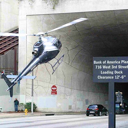 Fred North pulls a "police helicopter" to a quick stop as an Alfa Romeo "escapes" into a tunnel. In this case, North was flying what is known as the film ship as opposed to the camera ship.  This was filming an Alfa Romeo commercial in downtown Los Angeles. Photo courtesy of Fred North.