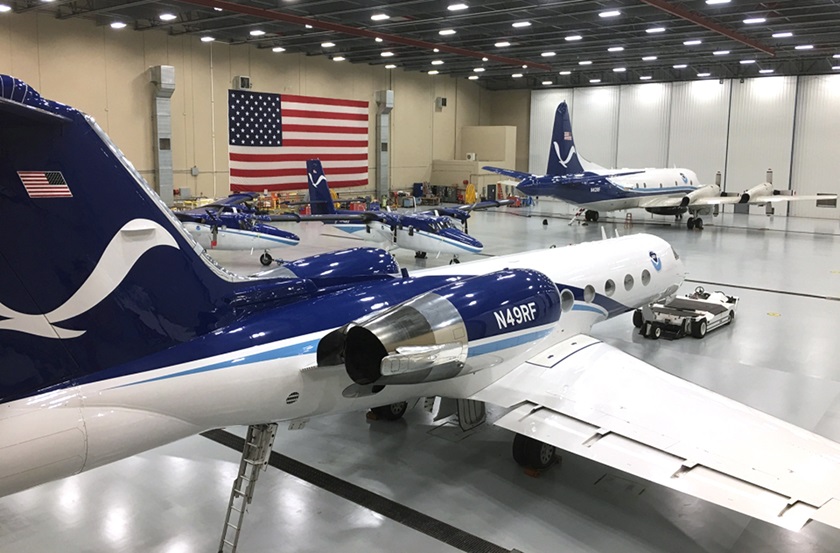 A fleet of aircraft are parked inside the National Oceanic and Atmospheric Administration Air Operations Center hangar at Lakeland Linder International Airport in Lakeland, Florida. Photo courtesy of NOAA.