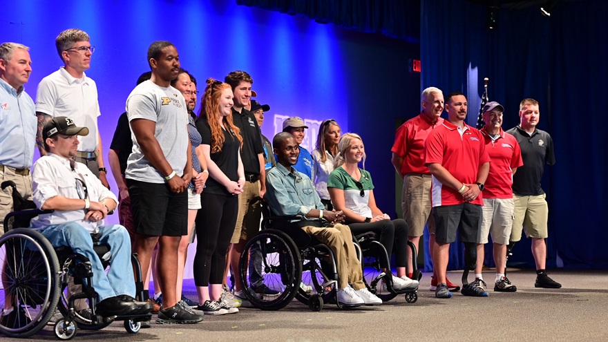 Able Flight scholarship recipients receive recognition during a pin ceremony at EAA’s Theater in the Woods. Six standouts earned their wings during a ceremony that included appearances by airshow great Patty Wagstaff and Ercoupe pilot Jessica Cox. Photo by David Tulis.