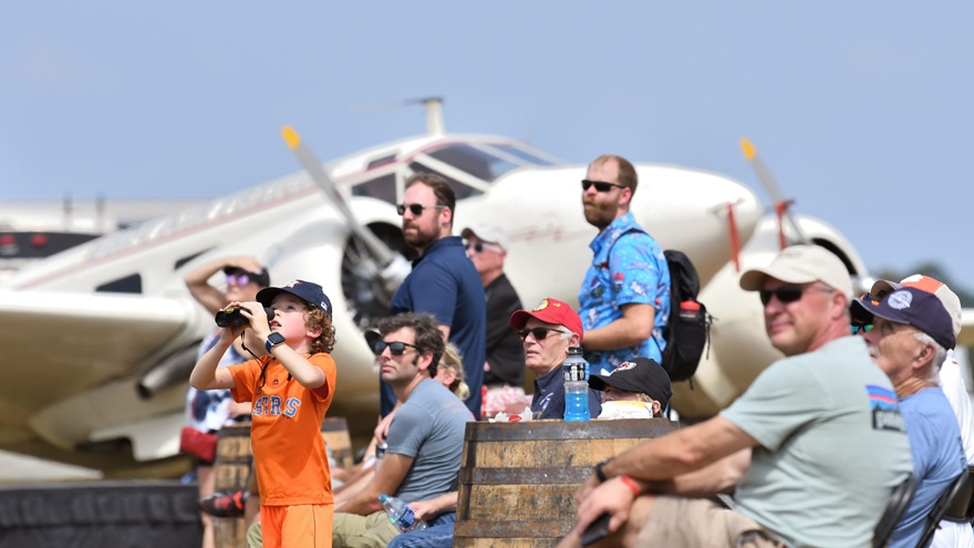 A small part of the large crowd at AOPA's Tullahoma Fly-In in 2019 watches the short takeoff and landing demonstration. Photo by Mike Collins.
