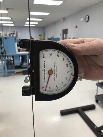 An Essco Calibration Laboratory technician tests a tensiometer. Photo courtesy of Jeff Simon.