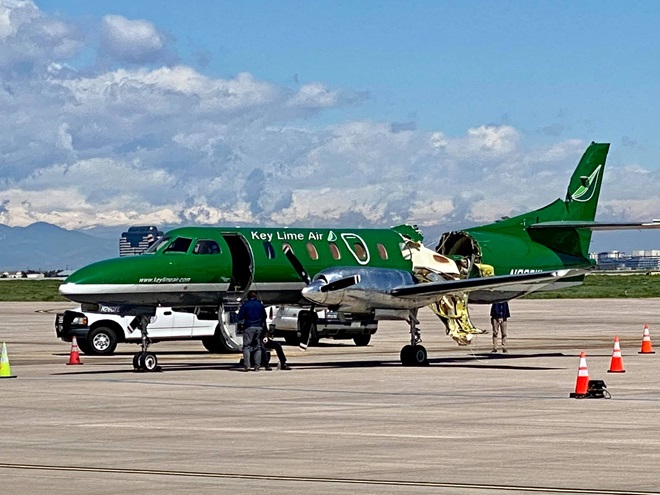 Bruce Graham was flying a Piper Cub in the traffic pattern for Runway 10 at Centennial Airport in Denver when two aircraft approaching the longer parallel runways collided. Graham watched the damaged Fairchild Swearingen Metroliner land. After landing himself, Graham sought a closer look and took this photograph. Photo courtesy of Bruce Graham.