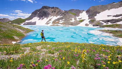 Ice Lake Basin Trail, one of the most popular hikes in the San Juan National Forest, takes you along meadows full of wildflowers and electric blue alpine lakes. Photo courtesy of Visit Telluride, Ryan Bonneau.