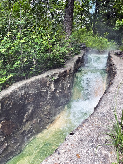 Hot Springs National Park turns 100 this year. It was created to protect and preserve the 47 thermal springs found here. This flow of hot spring water running down from Hot Spring Mountain is found on the Tufa Terrace Trail. Photo by MeLinda Schnyder.
