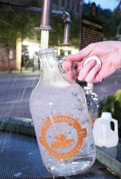 Fill bottles of the tasty—and tested—spring water so you can “quaff the elixir” at home. There are several thermal spring fountains and cold spring fountains throughout the park and downtown area. Photo by MeLinda Schnyder.