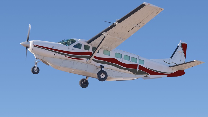A  forward fairing and aft strakes added to the factory cargo pod installed on a Cessna 208B Grand Caravan reduce the drag induced by the factory-installed cargo pod on the aircraft's belly. Photo courtesy of Raisbeck Engineering.