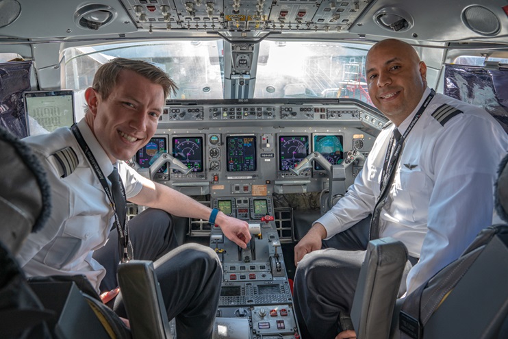 Pilots in the cockpit of an Embraer ERJ-145. Photo courtesy of Piedmont Airlines.