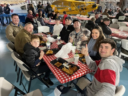 Aviators from Georgia elected for Zaxby’s chicken instead of chili due to food allergies, but that didn’t keep them from partaking in the fun. Photo by Cayla McLeod.